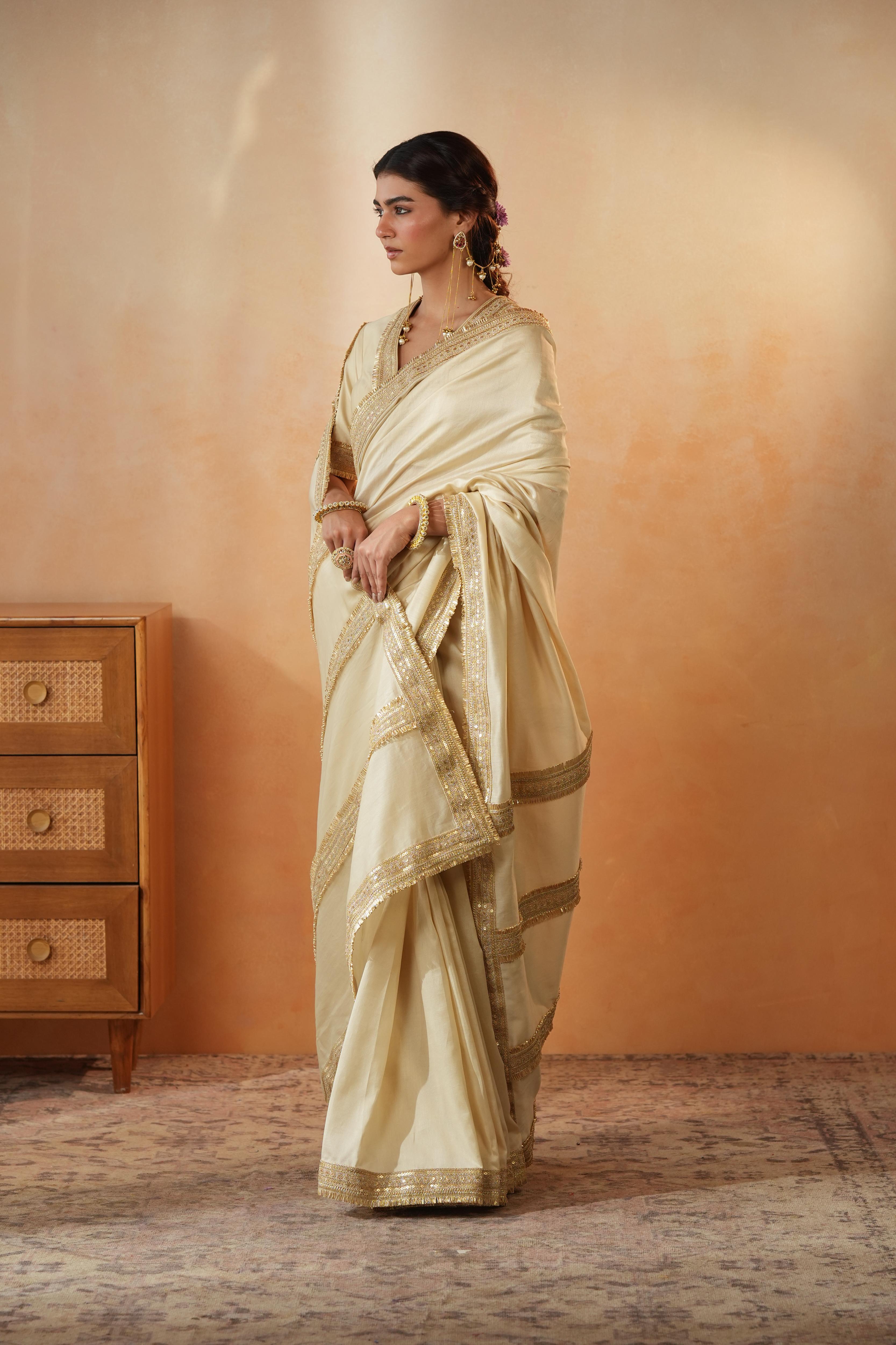Trisha Beige Border Saree