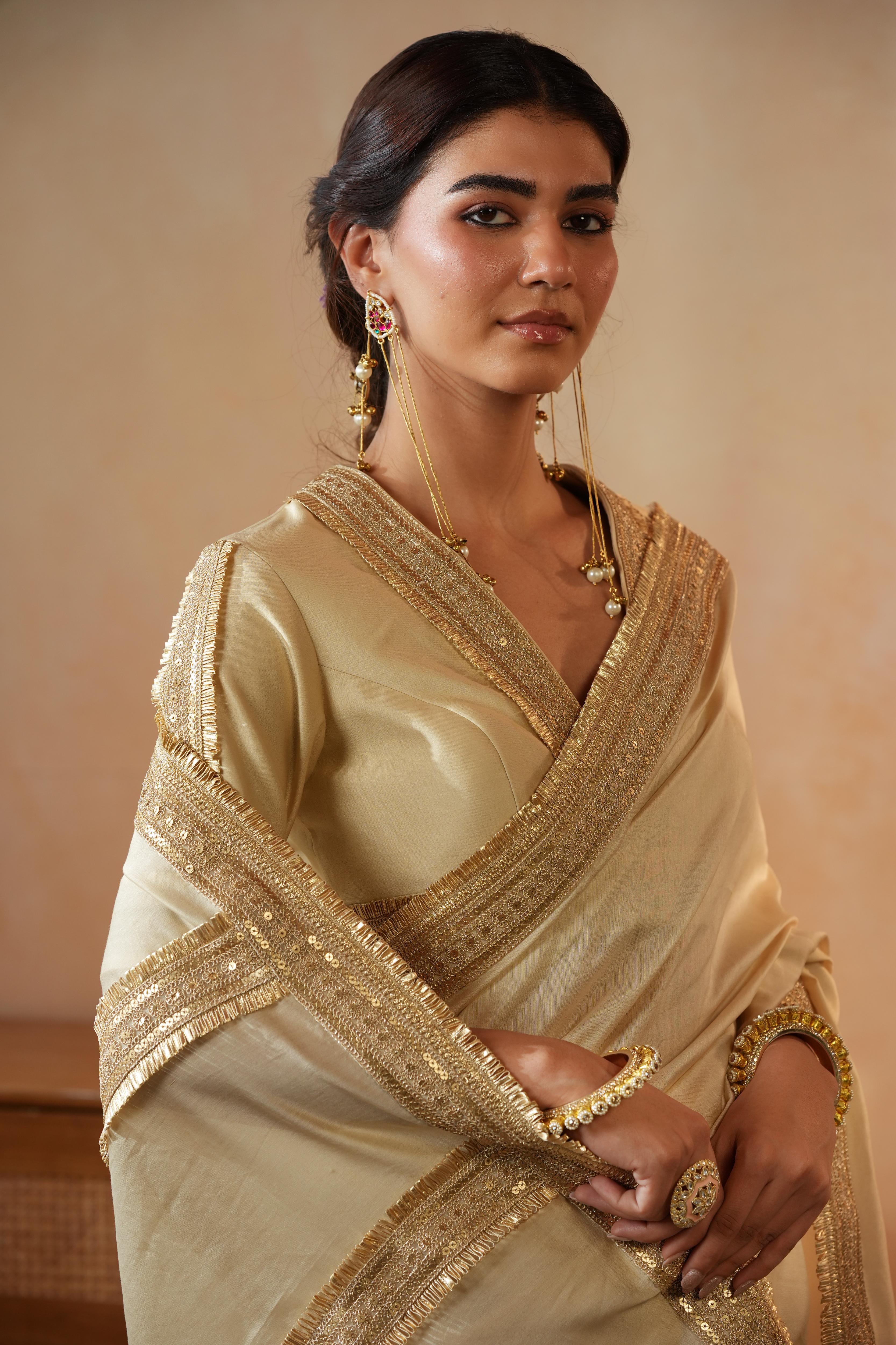 Trisha Beige Border Saree