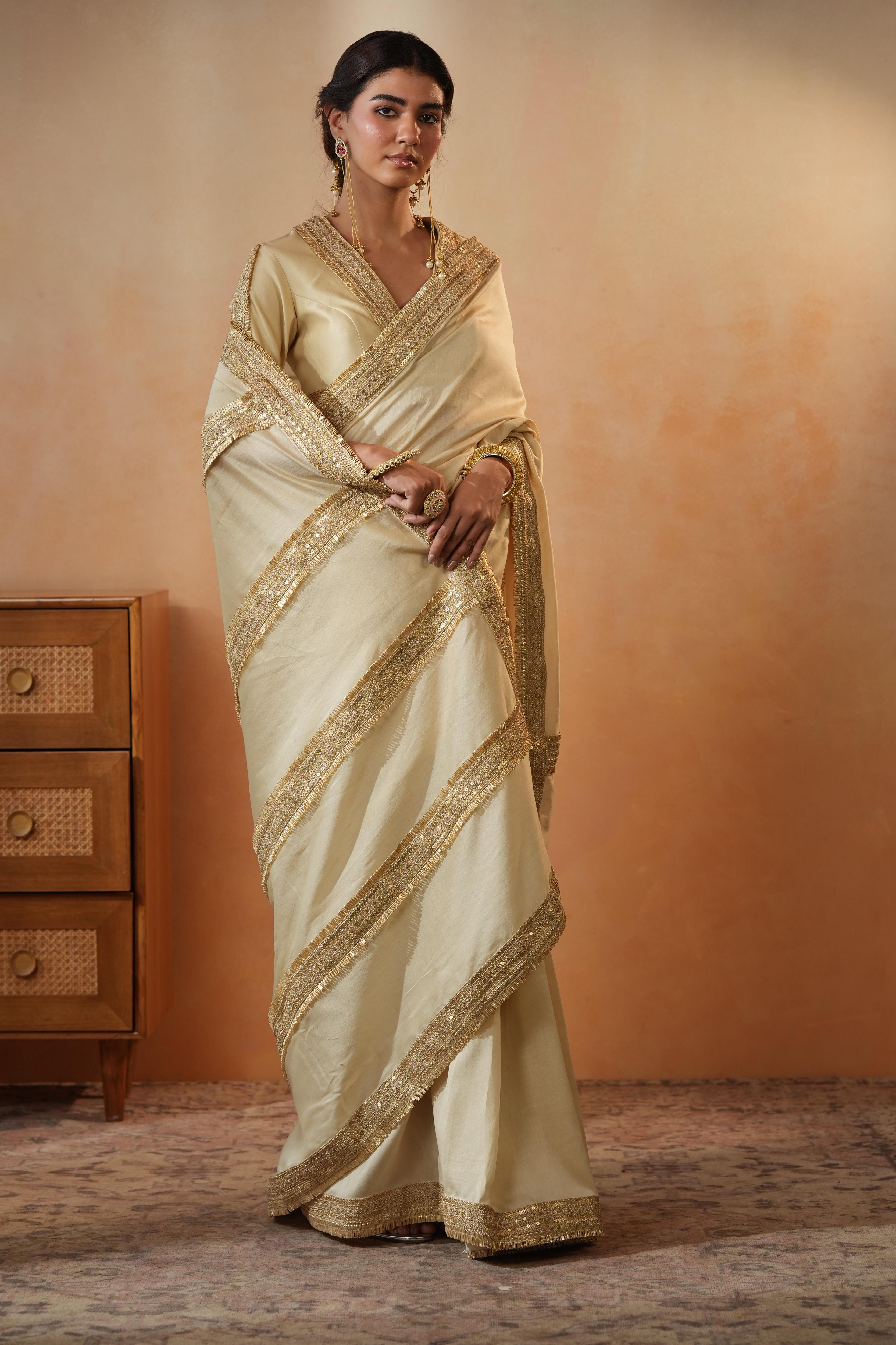 Trisha Beige Border Saree