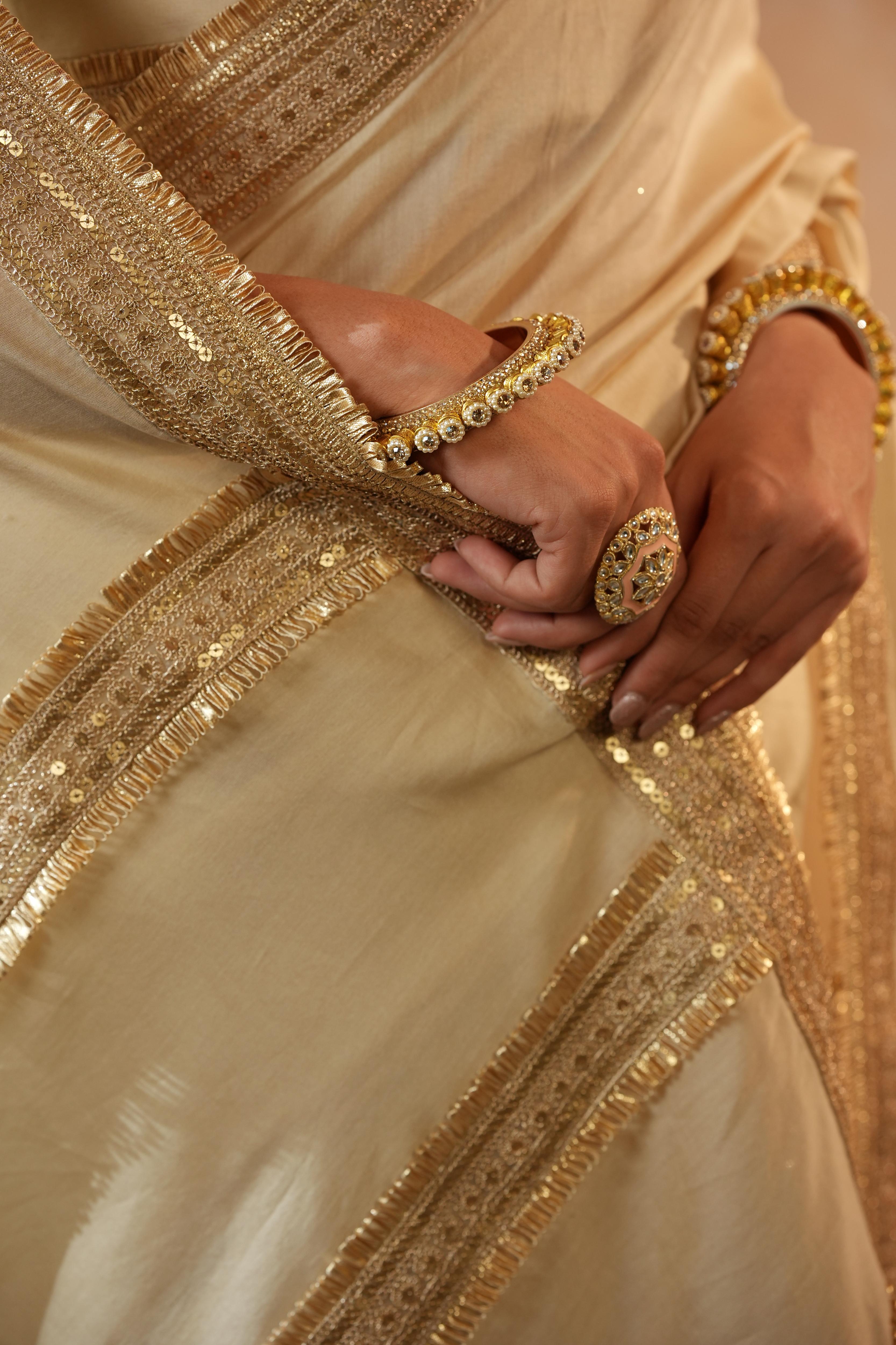 Trisha Beige Border Saree