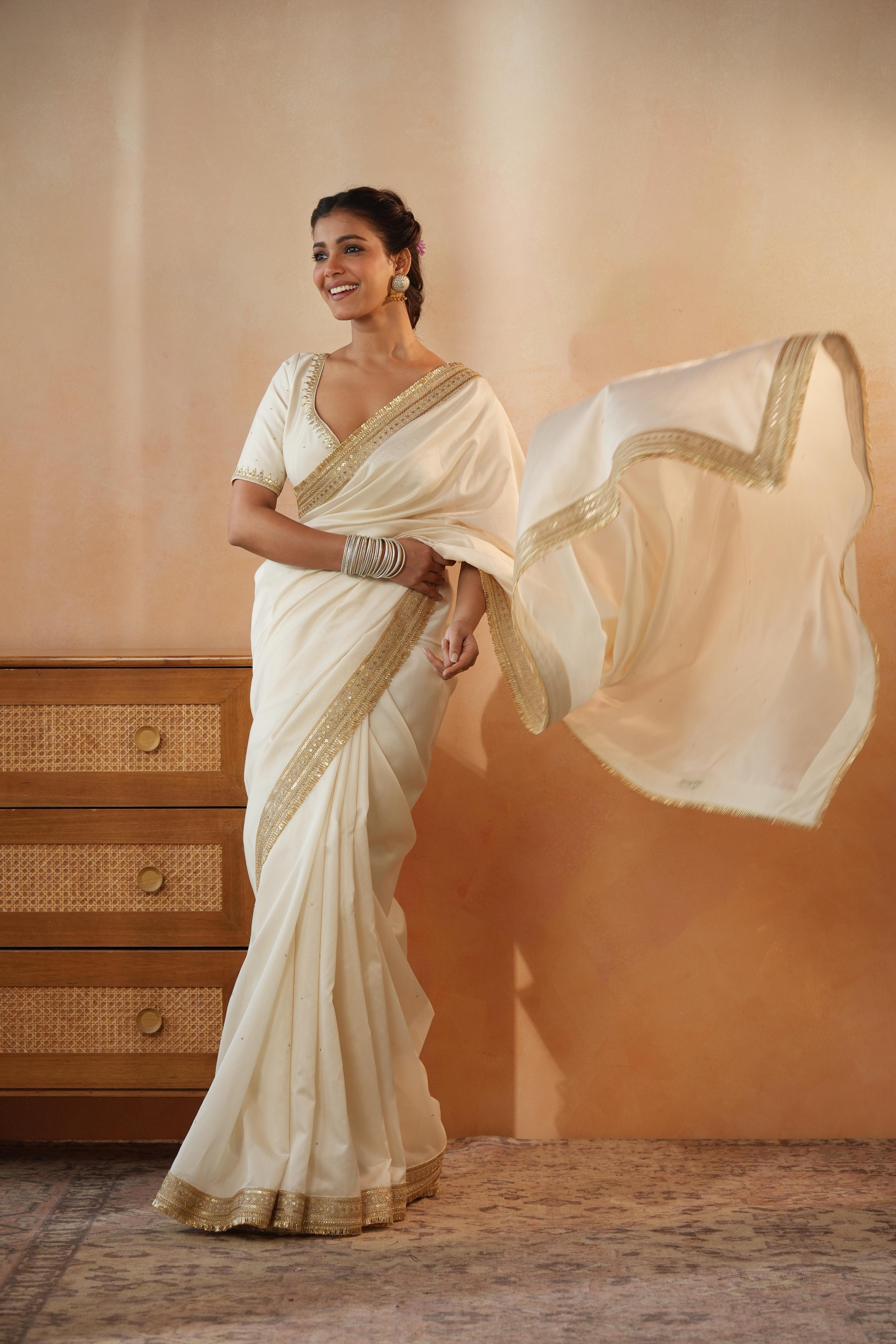 Trisha Ivory Border Saree